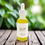 A bottle of CBD oil with a dropper, labeled 'CANNABIS CRAFT CBD OIL 500 MG'. The liquid is clear and has no visible flavor, scent, or color.